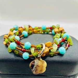 4 strand multistone turquoise and gemstone stretch bracelet w/ a floral pendant